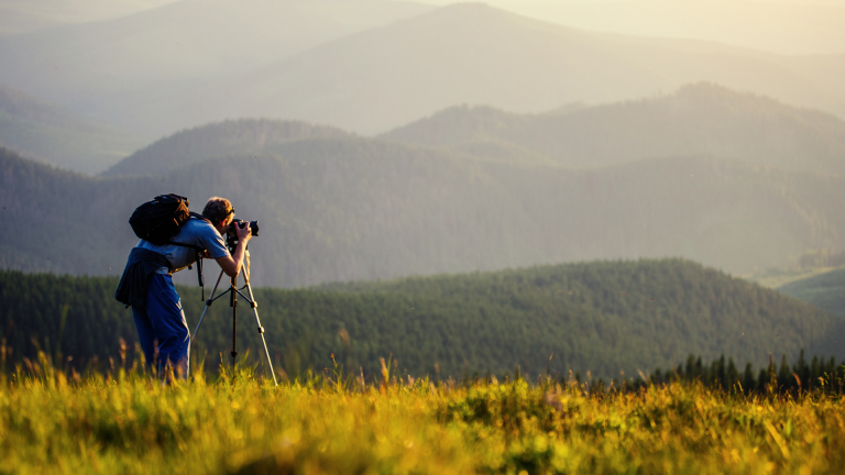 Guest capturing Rocky Mountain landscapes near Entrance, Alberta lodging